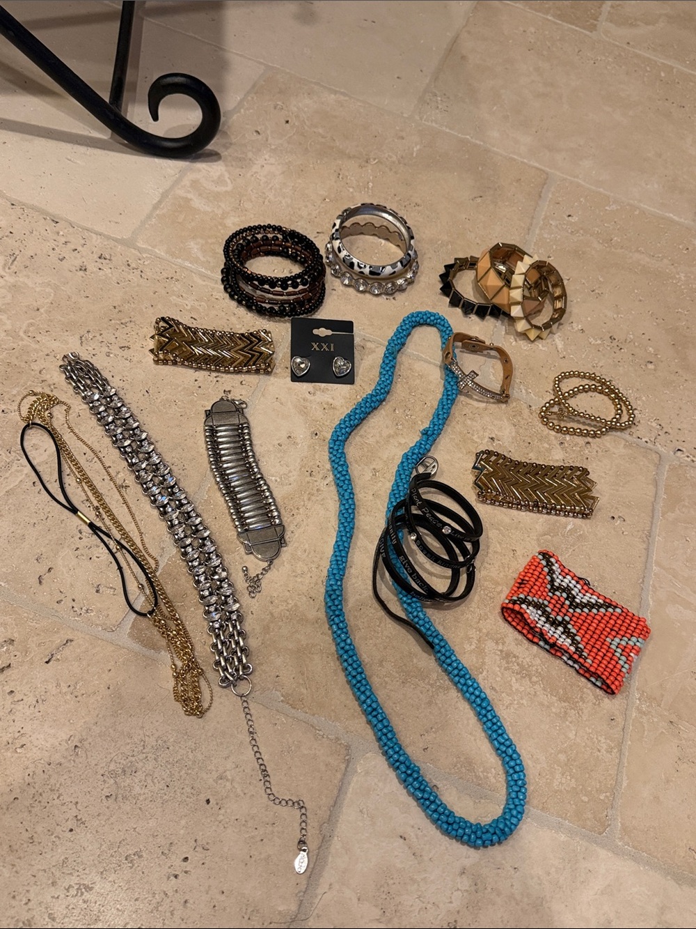 Array of jewelry necklace, bracelets sand a pair of earrings
